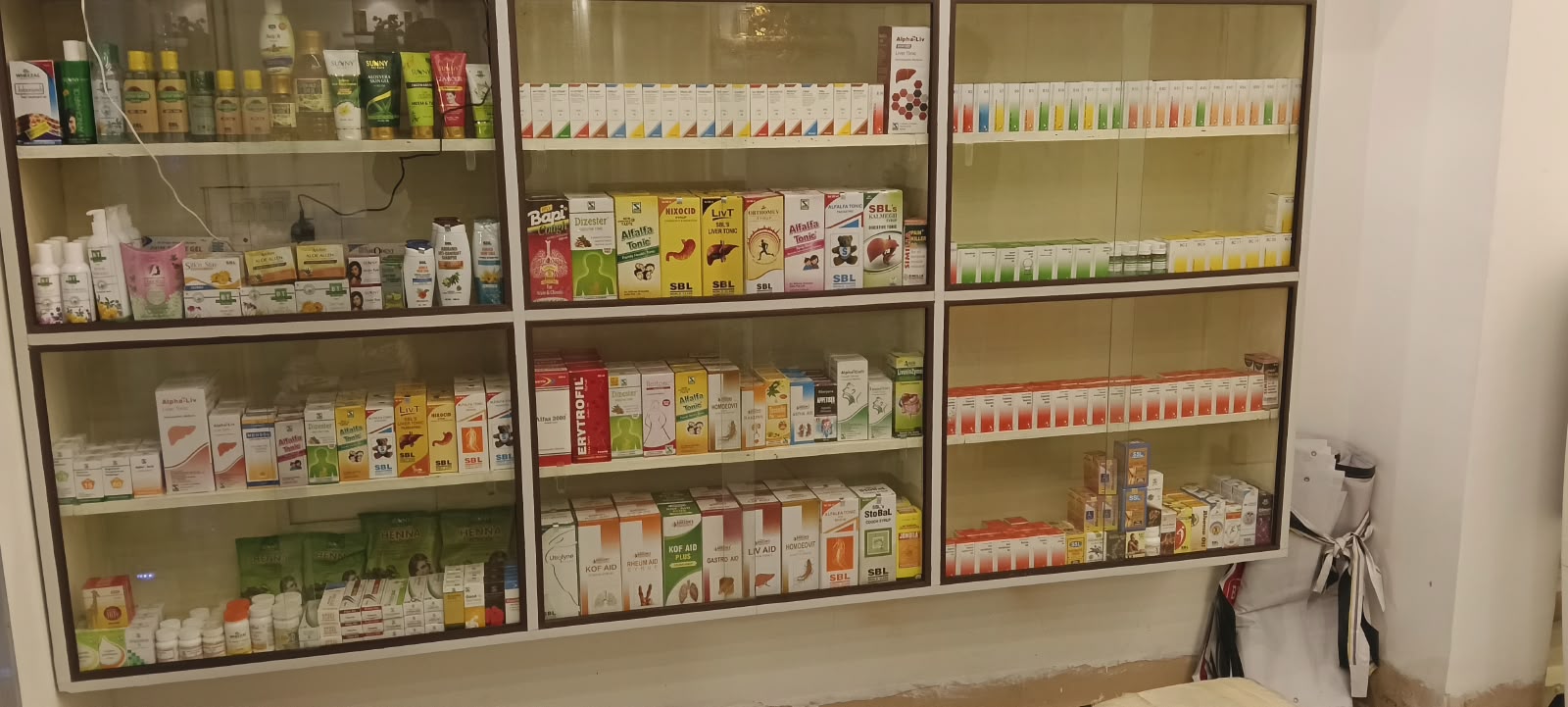 Homeopathic medicines arranged inside Sanjeevani pharmacy